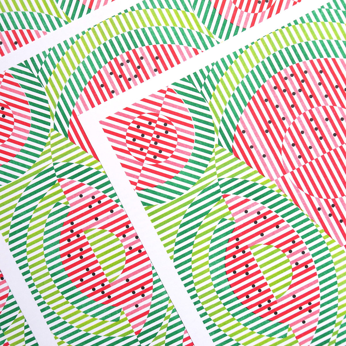 This print is called Watermelon. It has lime green, green, red, and black. The black dots are the seeds and it's an abstract representation of watermelon.