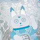 Close up of a lucky cat figure with chinoiserie elements done in metallic silver and cobalt blue.