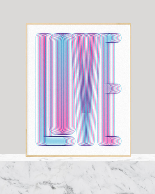 Framed print with the word LOVE in the center with a cyan magenta gradient.